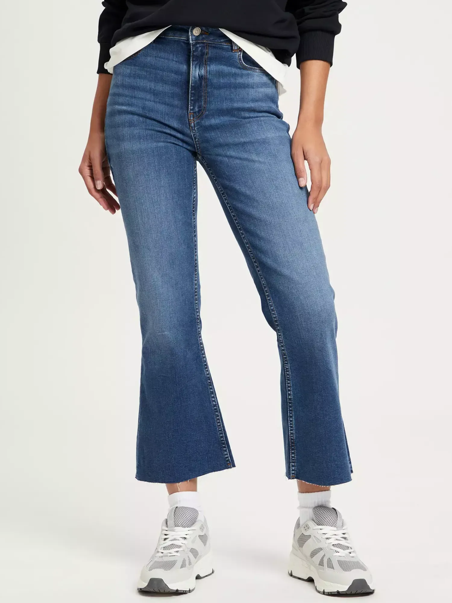 Jeansy damskie niebieskie Cropped Flare Fit P 518-005<Cross Jeans Online