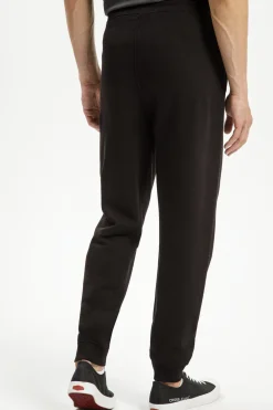 Spodnie męskie dresowe czarne 49072-020<Cross Jeans New